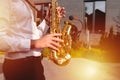 Golden Blues. Boys Band saxophone section at event , jazz player male playing on Saxophone, music instrument played by man saxopho Royalty Free Stock Photo