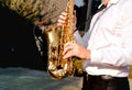 Golden Blues. Boys Band saxophone section at event , jazz player male playing on Saxophone, music instrument played by man saxopho Royalty Free Stock Photo