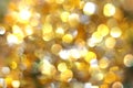 Golden blurred background bokeh yellow and white circles, glitter