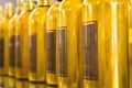 Golden bottles in a row, perspective shot