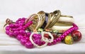 Golden bracelets and beads Royalty Free Stock Photo