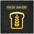 Golden bread bakery symbol black background