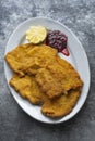 Golden breaded german schnitzel Royalty Free Stock Photo