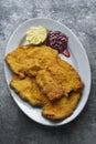 Golden breaded german schnitzel Royalty Free Stock Photo