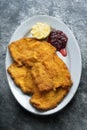Golden breaded german schnitzel Royalty Free Stock Photo
