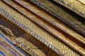 Golden, bronze and metallic tooled leather samples texture background Royalty Free Stock Photo