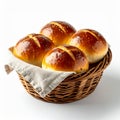 Golden Brown Baked Bread Rolls in Woven Basket on White Background Royalty Free Stock Photo