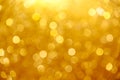 Golden brown bokeh sparkle glitter colorful patterns for Christmas festival or Happy new year background Royalty Free Stock Photo