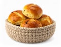 Golden Brown Bread Rolls in a Woven Basket on a White Background Royalty Free Stock Photo