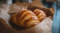 Golden Brown Croissants On Brown Paper Royalty Free Stock Photo