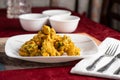 Pakoras on a white plate with dipping sauces Royalty Free Stock Photo