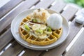 Golden brown waffle topped with ice cream Fruit and Cotton Candy Royalty Free Stock Photo