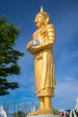 Golden buddha on blue sky