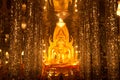 Golden buddha in glass church . Royalty Free Stock Photo