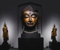 Golden Buddha head statue ancient art