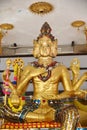 Golden buddha with many arms