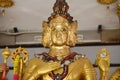 Golden buddha with many arms