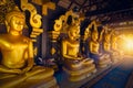 Golden Buddha row in Thailand temple at Lampang.