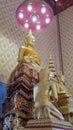 Golden Buddha Sculpture in white chapel