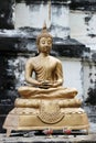 Golden buddha statue in ancient city