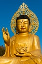 Golden Buddha statue at buddhist temple of Sanbanggulsa