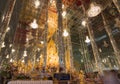 Golden Buddha statue at Cathedral glass, Temple in Thailand