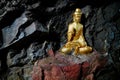 Golden buddha statue in the cave Royalty Free Stock Photo