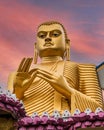 Golden Buddha statue in Dambulla Temple in Sri Lanka