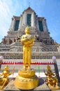 Golden buddha statue on the face of the temple walls Royalty Free Stock Photo