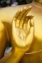 Golden Buddha statue hand Royalty Free Stock Photo