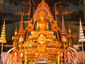 Golden buddha statue inside a temple Royalty Free Stock Photo