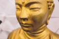 Golden buddha statue isolated on white background. Royalty Free Stock Photo