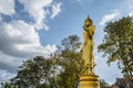 Golden buddha statue on the mountain at Wat Phrathat Khao Noi at nan thailand.