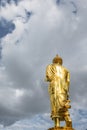 Golden buddha statue on the mountain at Wat Phrathat Khao Noi at nan thailand