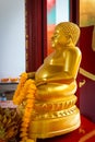 Golden Buddha Statue on an Ornate Altar at Canton Shrine