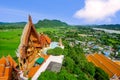 Golden buddha statue with rice fields and mountain background, W Royalty Free Stock Photo