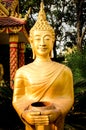 Golden buddha Statue in Vientiane, Laos. Royalty Free Stock Photo