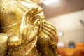 The golden Buddha statue.View of buddha statue in Thailand.Close up hand of statue Buddha.buddhism concept