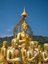 The golden Buddha statue was built outdoors. It is a symbol of the Wednesday religion