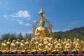 The golden Buddha statue was built outdoors. It is a symbol of the Wednesday religion