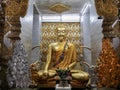 Golden Buddha statue at Wat Sanpayangluang in Lamphun, Thailand Royalty Free Stock Photo