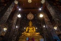 Golden Buddha statue in Wat Suthat Thepphawararam the royal temple of the first grade in Bangkok.