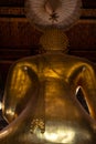 Golden Buddha statue in Wat Suthat Thepphawararam the royal temple of the first grade in Bangkok.