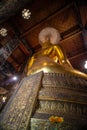 Golden Buddha statue in Wat Suthat Thepphawararam the royal temple of the first grade in Bangkok.