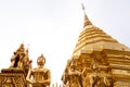 Golden buddha statues around golden pagoda on white background at Wat Phra That Doi Suthep temple, Chiangmai, Thailand. Wat Phra Royalty Free Stock Photo