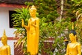 Golden Buddha statues in Louangphabang, Laos. Copy space for text. Royalty Free Stock Photo