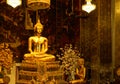 Golden Buddha statues in a Thai Buddhist temple. Royalty Free Stock Photo