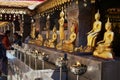 Golden Buddha statues in Wat Phra That Doi Suthep, Buddhist temple in Chiang Mai, Thailand. Royalty Free Stock Photo