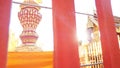 Golden Buddhist bell for prayer wishes in sunlight at Wat Phra T Royalty Free Stock Photo