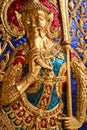 Golden buddhist figure at a temple